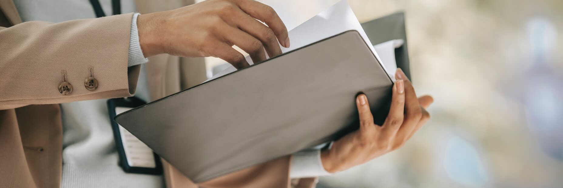 crop businesswoman with folder with documents